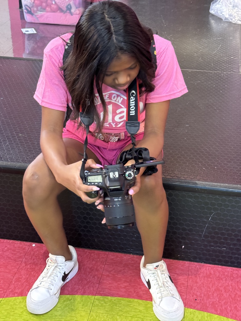 Haley working with a Canon camera